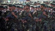 Members of Iran's Revolutionary Guards march during a military parade to commemorate the 1980-88 Iran-Iraq war in Tehran September 22, 2007. REUTERS/Morteza Nikoubazl/File Photo