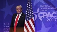 U.S. President Donald Trump walks on stage prior to his address to the Conservative Political Action Conference at the Gaylord National Resort and Convention Center February 24, 2017 in National Harbor, Maryland.  Alex Wong/AFP
