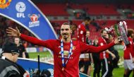  Manchester United's Swedish striker Zlatan Ibrahimovic celebrates with the trophy on the pitch after their victory in the English League Cup final football match between Manchester United and Southampton at Wembley stadium in north London on February 26,