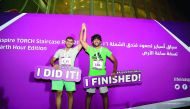 Participants celebrate reaching the top during ATSR 2016.