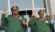 (L) Bakri Hassan Saleh. President Omar al-Bashir(R)