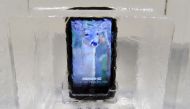 A Crosscall Trekker-X3 smartphone inside a block of ice on the first day of the Mobile World Congress in Barcelona on February 27 2017. Phones rugged enough to survive falling from the sky or resistant to foaming hand soap, just some of the special featur