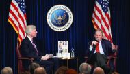 Frederick J Ryan, Jr (left) watches as former US president George W Bush speaks at Ronald Reagan Presidential Library as he promotes his upcoming book in California, yesterday.