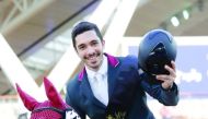 Qatari rider Salman Mohammed A S Al Emadi poses for a photograph astride Zorro Z after winning the CSI3* Table A. against the clock  1.45m event of CHI Al Shaqab at Al Shaqab Arena yesterday. Pictures by: Kamutty VP / Frank Sorge