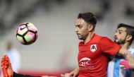 Action from the Qatar Stars League match between Al Rayyan and Al Wakra at Al Sadd Stadium in Doha yesterday. Al Rayyan won 4-0.
