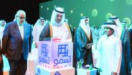 Prime Minister and Interior Minister H E Sheikh Abdullah bin Nasser bin Khalifa Al Thani and other dignitaries opening QITCOM 2017 at Qatar National Convention Center, yesterday. 