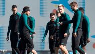 (L to R) Barcelona's midfielder Sergio Busquets, Barcelona's Brazilian forward Neymar, Barcelona's Argentinian forward Lionel Messi, Barcelona's Croatian midfielder Ivan Rakitic and Barcelona's defender Gerard Pique take part in a training session at the 
