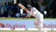 Sri Lankan cricketer Kusal Mendis plays a shot during the first day of the opening Test match between Sri Lanka and Bangladesh at the Galle International Cricket Stadium in Galle on March 7, 2017. (AFP / LAKRUWAN WANNIARACHCHI)