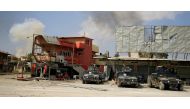 Smoke rises from clashes during a battle with Islamic State militants at Dawasa neighborhood in Mosul, Iraq, March 8, 2017. REUTERS/Thaier Al-Sudani