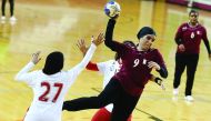 Hosts Qatar’s women handball team in action against Bahrain in the fifth GCC Women Games at Aspire Zone in Doha on Tuesday.