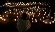 Candles are lit during a vigil for victims after a fire broke out at the Virgen de Asuncion home in San Jose Pinula on the outskirts of Guatemala City, March 8, 2017. Reuters/Saul Martinez
