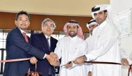 Officials cutting the ribbon at the launch event.