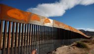 A US worker inspects a section of the US-Mexico border wall at Sunland Park, US opposite the Mexican border city of Ciudad Juarez, Mexico, November 9, 2016. Reuters/Jose Luis Gonzalez/File photo