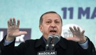 Turkish President Recep Tayyip Erdogan addresses supporters during a rally in Istanbul on March 11, 2017.  AFP / OZAN KOSE