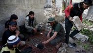 FILE PHOTO: Free Syrian Army fighters rest in the rebel-controlled area of Jobar a suburb of Damascus. Syria, March 23, 2016 (REUTERS / Bassam Khabieh)