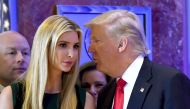 (FILES) This file photo taken on January 11, 2017 shows US President-elect Donald Trump talking to his daughter Ivanka during a press conference at Trump Tower in New York. AFP / Timothy A. Clary 