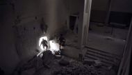 Members of the Iraqi forces enter the destroyed building of the museum of Mosul on March 11, 2017 after it was recaptured from Islamic State (IS) group fighters. Iraqi forces seized the building from IS on March 7 as they pushed into west Mosul as part of