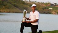 Indian golfer SSP Chawrasia poses with the trophy after he won the Hero Indian Open golf tournament at the Dlf Golf and Country Club in Gurgaon, on the outskirts of the Indian capital New Delhi, on March 12, 2017. (AFP / SAJJAD HUSSAIN)