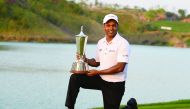 Indian golfer SSP Chawrasia poses with the trophy after he won the Hero Indian Open golf tournament at the Dlf Golf and Country Club in Gurgaon, yesterday.