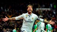 Real Madrid's defender Sergio Ramos celebrates after scoring a goal during the Spanish league footbal match Real Madrid CF vs Real Betis at the Santiago Bernabeu stadium in Madrid on March 12, 2017. / AFP / GERARD JULIEN
