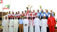 The podium winners in the Team Trial event at the 19th GCC Road Cycling Championship pose for a picture with officials at the Losail International Circuit. Picture: Salim Matramkot/The Peninsula