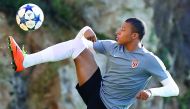 Monaco striker Kylian Mbappe Lottin controls the ball during a training session on the eve of their UEFA Champions League match against Manchester City at the Louis II Stadium in Monaco. 