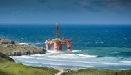 A picture taken on August 8, 2016, shows the Transocean Winner oil rig after it ran aground at Dalmore on the Isle of Lewis in northern Britain during a storm (AFP / Paul McGinley)