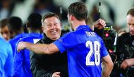 Leicester City manager Craig Shakespeare celebrates with Christian Fuchs after the UEFA Champions League Round of 16 Second Leg match against Sevilla at the King Power Stadium, Leicester, England on Tuesday.
