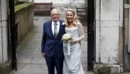 Media Mogul Rupert Murdoch and former supermodel Jerry Hall outside St Bride's church following a service to celebrate their wedding in London, Britain March 5, 2016 (REUTERS / Peter Nicholls) 