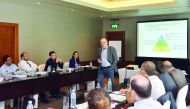 Participants attending a session on event management.