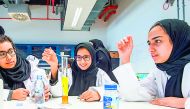Students busy conducting a science experiment. 