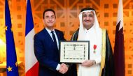 Ambassador of France, Eric Chevallier, presenting the insignia of Officer of the Legion of Honor to Bader Abdullah Al Darwish, Chairman and Managing Director of Darwish Holding.