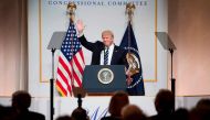 US President Donald Trump waves to the crowd as he arrives to address the annual National Republican Congressional Committee dinner in Washington, DC. AFP / JIM WATSON