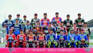 MotoGP riders pose for a family portrait at the Losail International Circuit ahead of Sunday's Grand Prix of Qatar. 