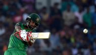 Bangladesh cricketer Tamim Iqbal plays a shot during the first one day international (ODI) cricket match between Sri Lanka and Bangladesh at The Rangiri Dambulla International Cricket Stadium in Dambulla on March 25, 2017. (AFP / Ishara S. KODIKARA)