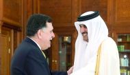 Emir H H Sheikh Tamim bin Hamad Al Thani with Chairman of the Presidential Council of Libya and Prime Minister of the Government of National Accord, Fayez Al Sarraj, at Emiri Diwan yesterday. Al Sarraj briefed the Emir on the latest developments in Libya 