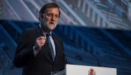 Spanish Prime Minister Mariano Rajoy makes the opening speech during a conference on infrastructure under the slogan 