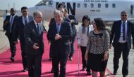 A handout picture released by the United Nations Assistance Mission for Iraq shows UN Secretary-General Antonio Guterres (C) being welcomed at Baghdad's international airport on March 30, 2017.  AFP / UNITED NATIONS 
