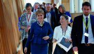 Scotland's First Minister Nicola Sturgeon returns from the chamber in Parliament in Edinburgh, Scotland, Britain March 29, 2017. REUTERS/Russell Cheyne
