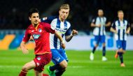Hertha Berlin's midfielder Alexander Esswein and Hoffenheim's Croatian forward Andrej Kramaric vie for the ball during the German First division Bundesliga football match Hertha Berlin v Hoffenheim at the Olympic Stadium in Berlin, on March 31, 2017.  AFP