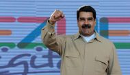 Venezuela's President Nicolas Maduro gestures during a meeting with supporters in Caracas, Venezuela March 31, 2017. Miraflores Palace