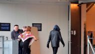 A person supposedly being the US artist Bob Dylan wearing a black jacket and a hoodie is photographed while entering the backstage door at Stockholm Waterfront April 1, 2017, where Bob Dylan is preforming the same night. There is no certain confirmation y
