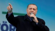 Turkish President Tayyip Erdogan addresses his supporters during a rally for the upcoming referendum in the Black Sea city of Rize, Turkey, April 3, 2017. REUTERS/Umit Bektas
