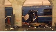 A picture shows the damaged train carriage at Technological Institute metro station in Saint Petersburg on April 3, 2017. AFP / STR / ALTERNATIVE CROP
