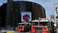 New York City firefighters stand by near Penn Station in New York April 3, 2017 after responding to a derailment of a NJ Transit train at Penn Station this morning. NJ TRANSIT said all 1,200 passengers on board were offloaded with only 4 minor injuries. A