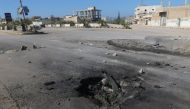 A crater is seen at the site of an airstrike, after what rescue workers described as a suspected gas attack in the town of Khan Sheikhoun in rebel-held Idlib, Syria April 4, 2017. REUTERS/Ammar Abdullah TPX IMAGES OF THE DAY.