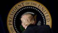 US President Donald Trump leaves after adressing a forum with Chief Executive Officers on the White House Campus April 4, 2017 in Washington, DC. / AFP / Brendan Smialowski