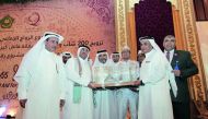 Officials being presented a memento during the ceremony in Jakarta.
