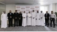Ooredoo officials after signing the agreement.