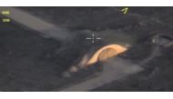 A handout grab image made on April 8, 2017 from a video made available by the Russian Defence Ministry's press service on the official website of the Russian Defence Ministry shows landing and strips at the Shayrat airbase after it was hit by US strike.  